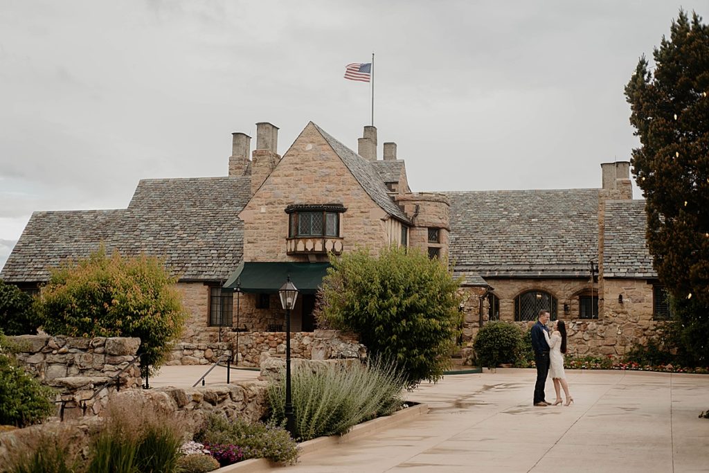 couple in front of building at cherokee ranch
