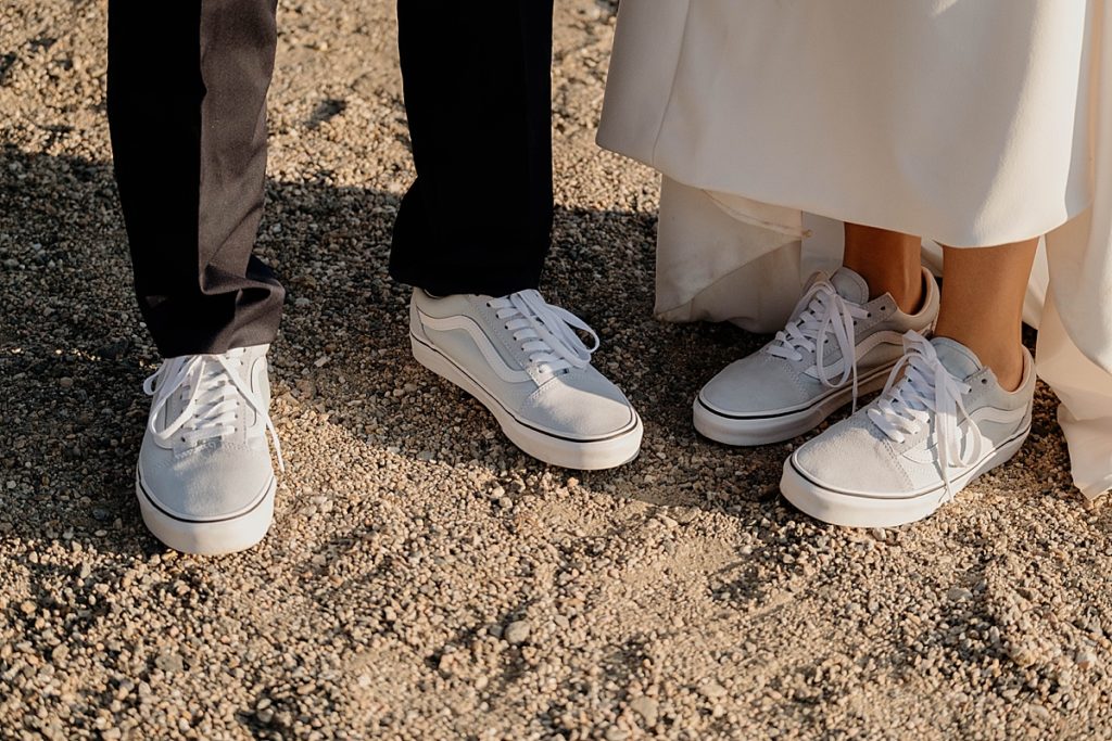 bride and groom wearing vans at wedding