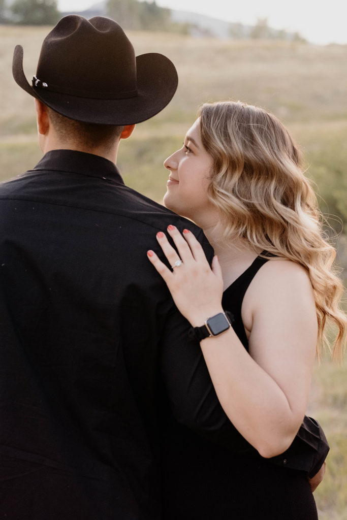 engagement photos in colorado showing off engagement rings